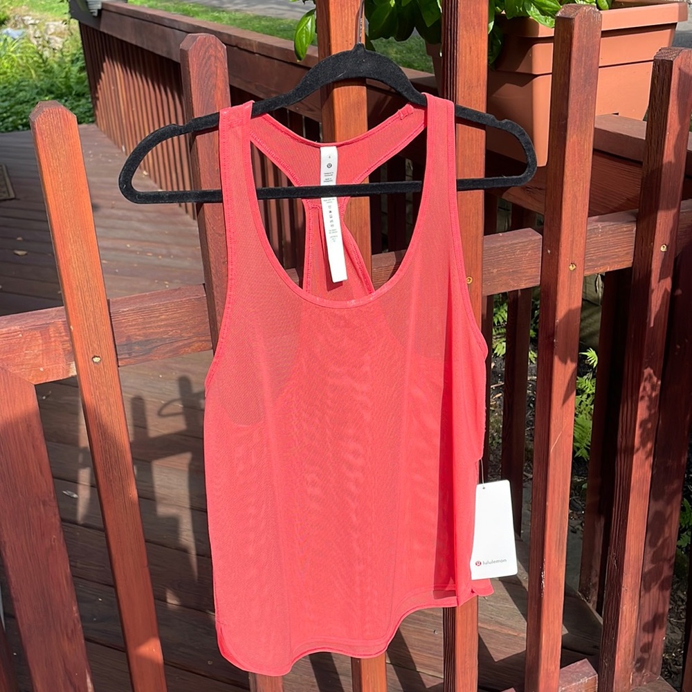 Lululemon Tank. New with Tags  Beautiful Apricot color. Size 4